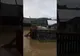 Gospodării inundate și drumuri blocate la Vatra Moldoviței, după o ploaie torențială VIDEO