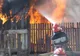 Incendiu de la o afumătoare. O anexă a fost cuprinsă de flăcări