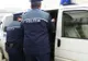 Hoți cu tupeu. Doi tineri au furat în plină zi toba de eșapament a unui camion