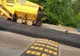 Fălticeni. Drumarii au turnat covor asfaltic peste un limitator de viteză FOTO