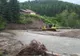 Gospodărie din Izvoarele Sucevei în pericol după ce viiturile au măcinat malul râului Suceava Foto