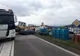 FOTO: La un pas de tragedie- un utilaj a căzut peste două mașini