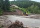 Gospodărie din Izvoarele Sucevei în pericol după ce viiturile au măcinat malul râului Suceava Foto